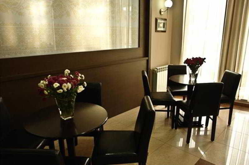 Hotel Porta سكوبجي المطعم الصورة